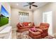 Cozy Gathering room with comfortable seating and a large TV at 225 Pesaro Dr, North Venice, FL 34275