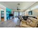 Spacious living room with hardwood floors and comfy seating at 1940 Inverness Greens Dr # 1940, Sun City Center, FL 33573