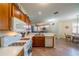 Updated kitchen with white countertops and wooden cabinetry at 1940 Inverness Greens Dr # 1940, Sun City Center, FL 33573