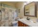 Simple bathroom with a shower/tub combo, toilet, and vanity at 1940 Inverness Greens Dr # 1940, Sun City Center, FL 33573