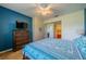 Comfortable bedroom with a queen-size bed and en-suite bathroom access at 1940 Inverness Greens Dr # 1940, Sun City Center, FL 33573