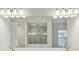 Modern bathroom with double vanity and a walk-in shower at 149 Hidden Estates Ct, Brandon, FL 33511