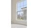 Relaxing bathroom featuring a large soaking tub and window with a view at 149 Hidden Estates Ct, Brandon, FL 33511