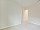 Bright bedroom with carpet flooring and an open door to hallway at 149 Hidden Estates Ct, Brandon, FL 33511