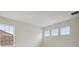 Bedroom with multiple windows offering abundant natural light at 149 Hidden Estates Ct, Brandon, FL 33511
