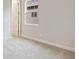 Well-lit bedroom featuring neutral walls and carpet at 149 Hidden Estates Ct, Brandon, FL 33511