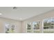Spacious living room featuring large windows and recessed lighting at 149 Hidden Estates Ct, Brandon, FL 33511
