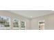 Light-filled living room with multiple windows and neutral walls at 149 Hidden Estates Ct, Brandon, FL 33511