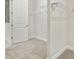 Large walk-in closet with wire shelving and neutral carpeting at 149 Hidden Estates Ct, Brandon, FL 33511