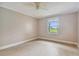 Bright bedroom featuring tile floors and a ceiling fan at 1920 Cedar Run Ct, Plant City, FL 33563