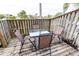 Small patio with table and chairs, perfect for outdoor dining at 6504 Abaco Dr # 101, Apollo Beach, FL 33572