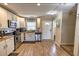 Bright kitchen features granite countertops, stainless steel appliances, and ample cabinet space at 6504 Abaco Dr # 101, Apollo Beach, FL 33572