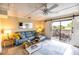 Spacious living room with sliding glass doors leading to a private deck at 6504 Abaco Dr # 101, Apollo Beach, FL 33572