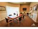 Well-lit meeting room featuring a large table and comfortable chairs at 17104 Carrington Park Dr # 528, Tampa, FL 33647
