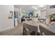 Dining area with table and chairs, offering open views to the living area at 17104 Carrington Park Dr # 528, Tampa, FL 33647