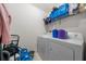 Laundry room with washer, dryer, and shelving at 17104 Carrington Park Dr # 528, Tampa, FL 33647