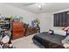 Spacious bedroom with double bed, dresser, and plenty of closet space at 17104 Carrington Park Dr # 528, Tampa, FL 33647