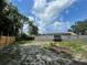 Spacious backyard with a large deck and fenced-in area at 18940 Emerald Ridge Dr, Hudson, FL 34667