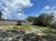 Spacious backyard with a large deck and fenced-in area at 18940 Emerald Ridge Dr, Hudson, FL 34667
