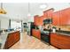 Modern kitchen with ample cabinetry and granite countertops at 18940 Emerald Ridge Dr, Hudson, FL 34667