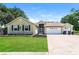Charming single-Gathering home with a two-car garage at 18940 Emerald Ridge Dr, Hudson, FL 34667