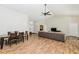 Open concept living and dining area with hardwood floors at 18940 Emerald Ridge Dr, Hudson, FL 34667
