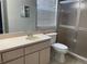 Bathroom with vanity, toilet, and shower at 18940 Emerald Ridge Dr, Hudson, FL 34667