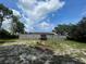 Spacious backyard with a large deck and fenced-in area at 18940 Emerald Ridge Dr, Hudson, FL 34667
