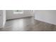 Bright, open bedroom featuring hardwood floors and natural light at 5530 N 9Th St # 5, Tampa, FL 33604