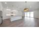Spacious kitchen features an island, modern appliances, and plenty of natural light at 5530 N 9Th St # 5, Tampa, FL 33604