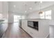 Modern kitchen features an island with a microwave, sink, and breakfast bar at 5530 N 9Th St # 5, Tampa, FL 33604