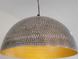 Close up shot of a domed light fixture with decorative perforation detail at 5530 N 9Th St # 5, Tampa, FL 33604