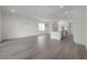 Open floor plan featuring hardwood floors connecting the living and kitchen area at 5530 N 9Th St # 5, Tampa, FL 33604