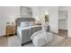 Well-appointed bedroom with a plush bed, modern decor, and a glimpse of the bathroom at 5530 N 9Th St # 5, Tampa, FL 33604