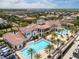 Aerial view of community with pool, clubhouse and marina at 6030 Printery St # 105, Tampa, FL 33616