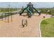 Playground with slides, swings, and play structures at 5474 Leslie Canyon Dr, Wimauma, FL 33598