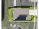 An overhead view of a house showing solar panels on the roof and backyard at 5474 Leslie Canyon Dr, Wimauma, FL 33598