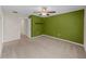 Spacious bedroom with ceiling fan and carpet flooring at 5474 Leslie Canyon Dr, Wimauma, FL 33598