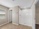 Bathroom with a shower stall and tile flooring at 5474 Leslie Canyon Dr, Wimauma, FL 33598