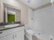 Bathroom with single vanity, toilet, and shower at 5474 Leslie Canyon Dr, Wimauma, FL 33598