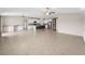 Open concept kitchen with island and stainless steel appliances at 5474 Leslie Canyon Dr, Wimauma, FL 33598