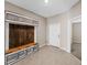 A spacious mudroom with a custom-built bench and storage at 5474 Leslie Canyon Dr, Wimauma, FL 33598