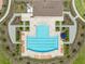 Community pool with lap lanes and surrounding landscaping at 5474 Leslie Canyon Dr, Wimauma, FL 33598