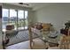 Bright living room with water views, comfortable seating and dining area at 549 Bahia Beach Blvd, Ruskin, FL 33570