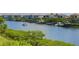 Waterfront homes with boats and lush greenery at 549 Bahia Beach Blvd, Ruskin, FL 33570