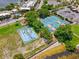 Aerial view of tennis and pickleball courts near waterfront at 549 Bahia Beach Blvd, Ruskin, FL 33570