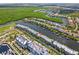 Aerial view of waterfront property, showcasing location and canal access at 549 Bahia Beach Blvd, Ruskin, FL 33570
