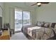 Main bedroom with water view and king-size bed at 549 Bahia Beach Blvd, Ruskin, FL 33570