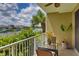 Balcony overlooking waterfront with table and chairs, perfect for relaxing at 549 Bahia Beach Blvd, Ruskin, FL 33570