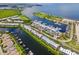 Aerial view of waterfront property with a marina at 549 Bahia Beach Blvd, Ruskin, FL 33570